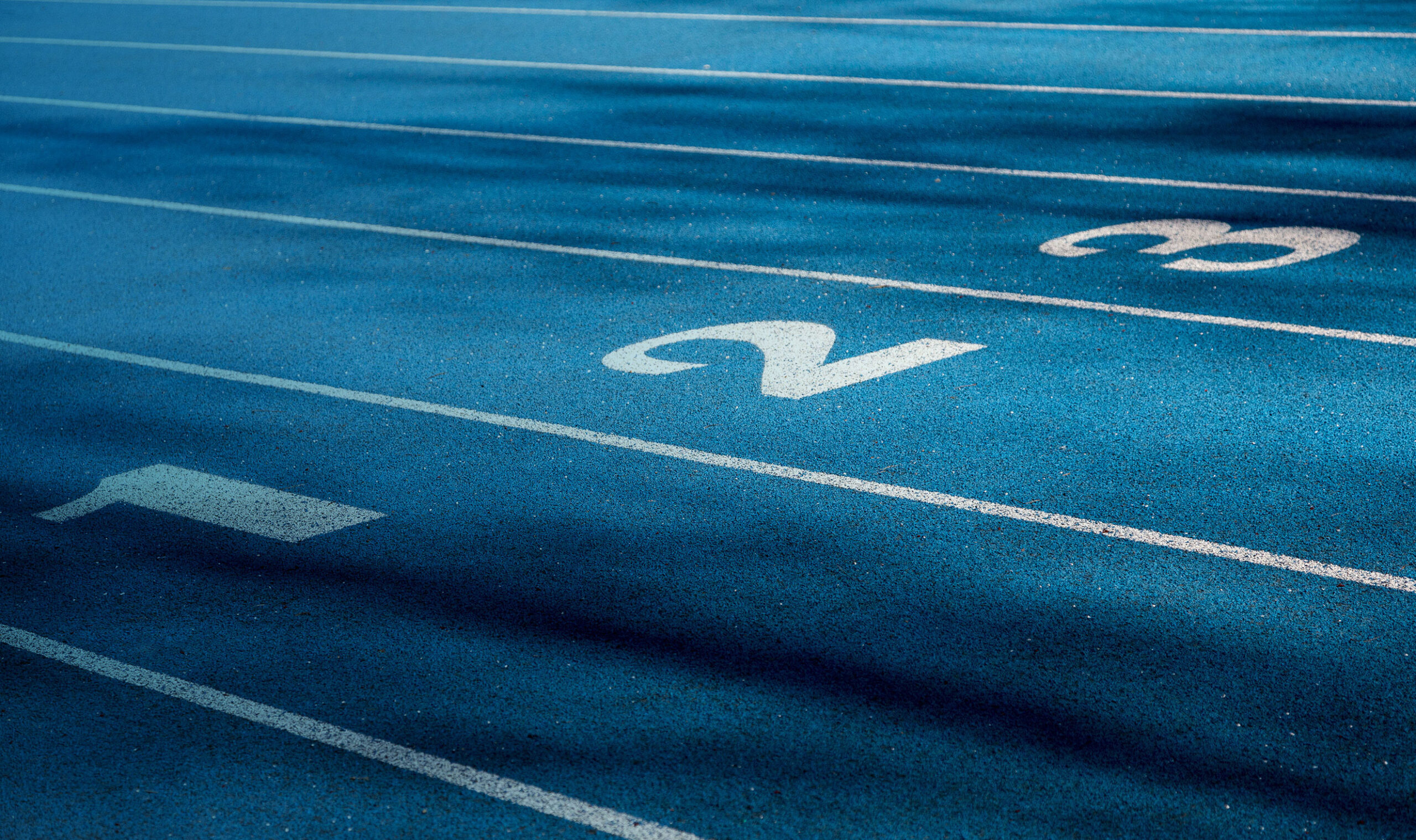 Lanes 1, 2, and 3 on a track and field track.