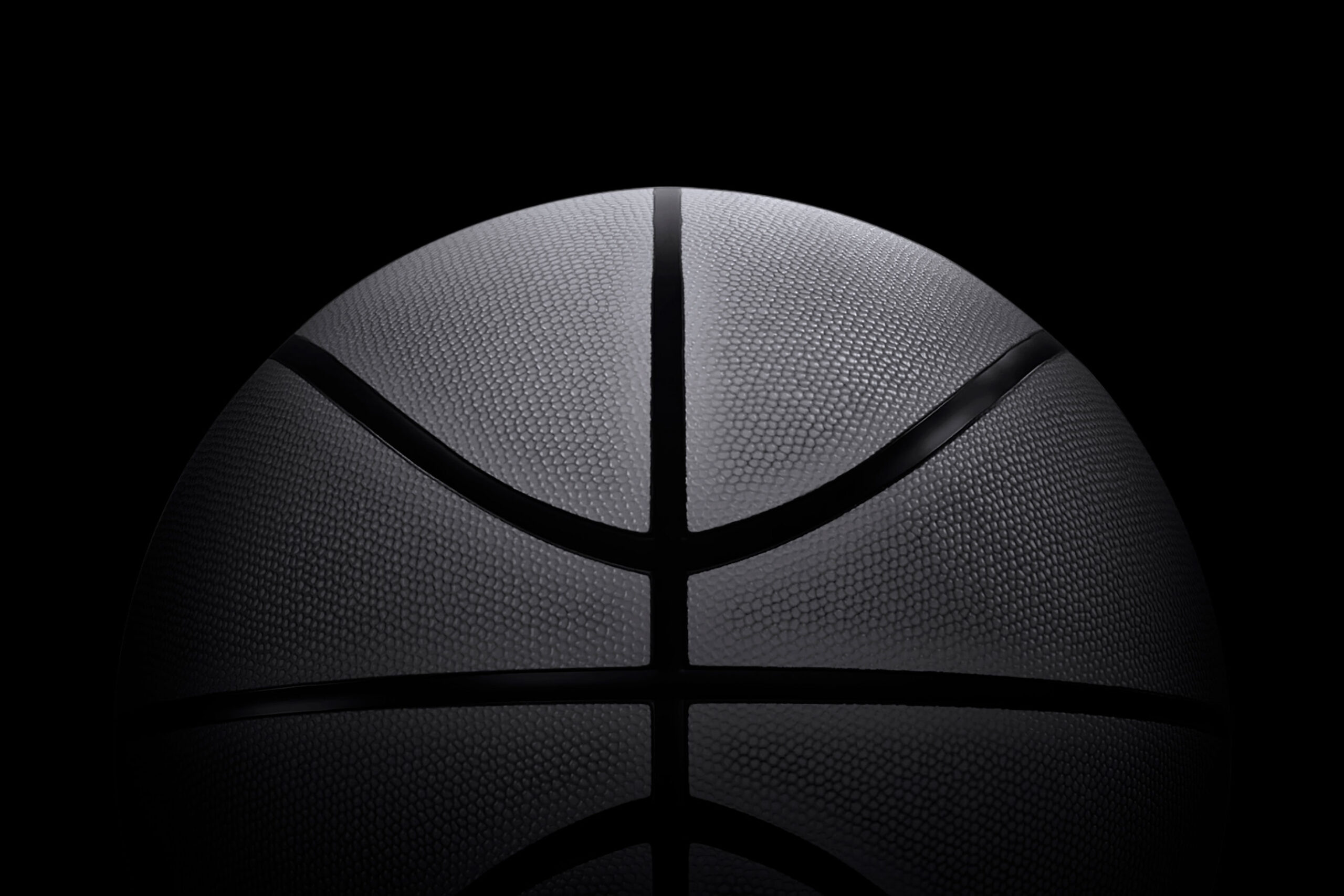 A black-and-white image of a basketball.